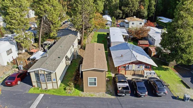 an aerial view of a house with a garden