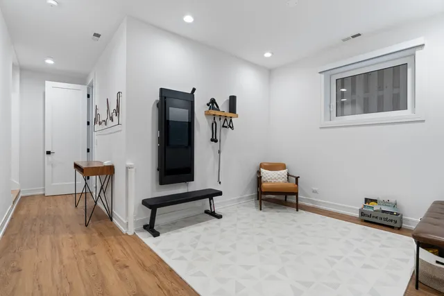 a room with furniture and wooden floor