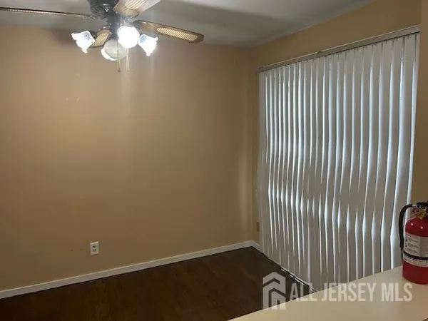 a view of a livingroom with a ceiling fan
