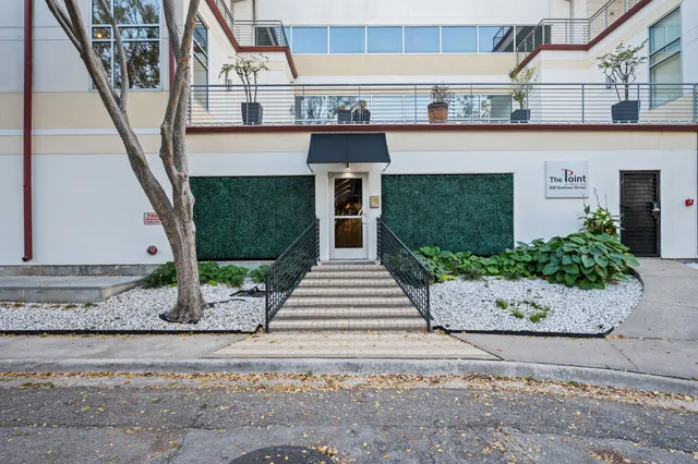 a front view of a house with garage