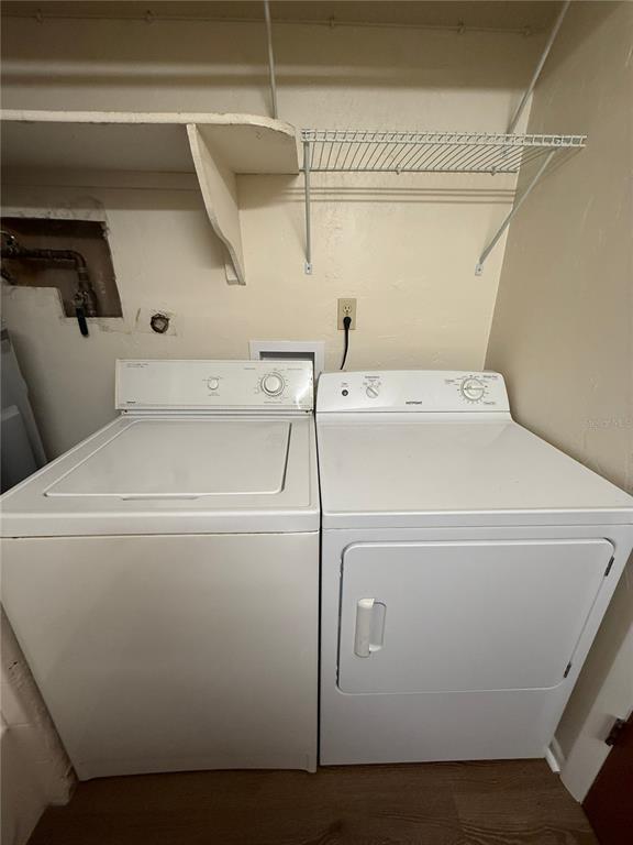 1923 Northwest 23rd Boulevard, Unit 224 Gainesville, FL 32605 - Photo 11 of 20 a utility room with dryer and washer