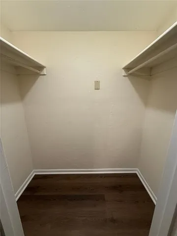 a view of small space with racks on the wall