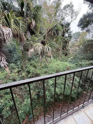 a view of a balcony with outdoor space
