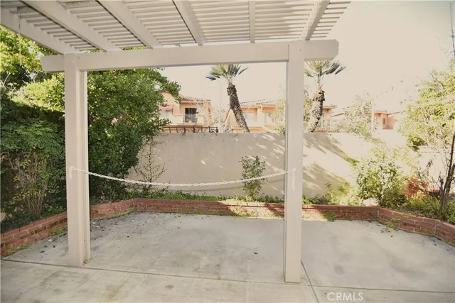 a view of outdoor space walk in closet and patio