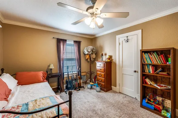 a view of a livingroom with furniture and workspace
