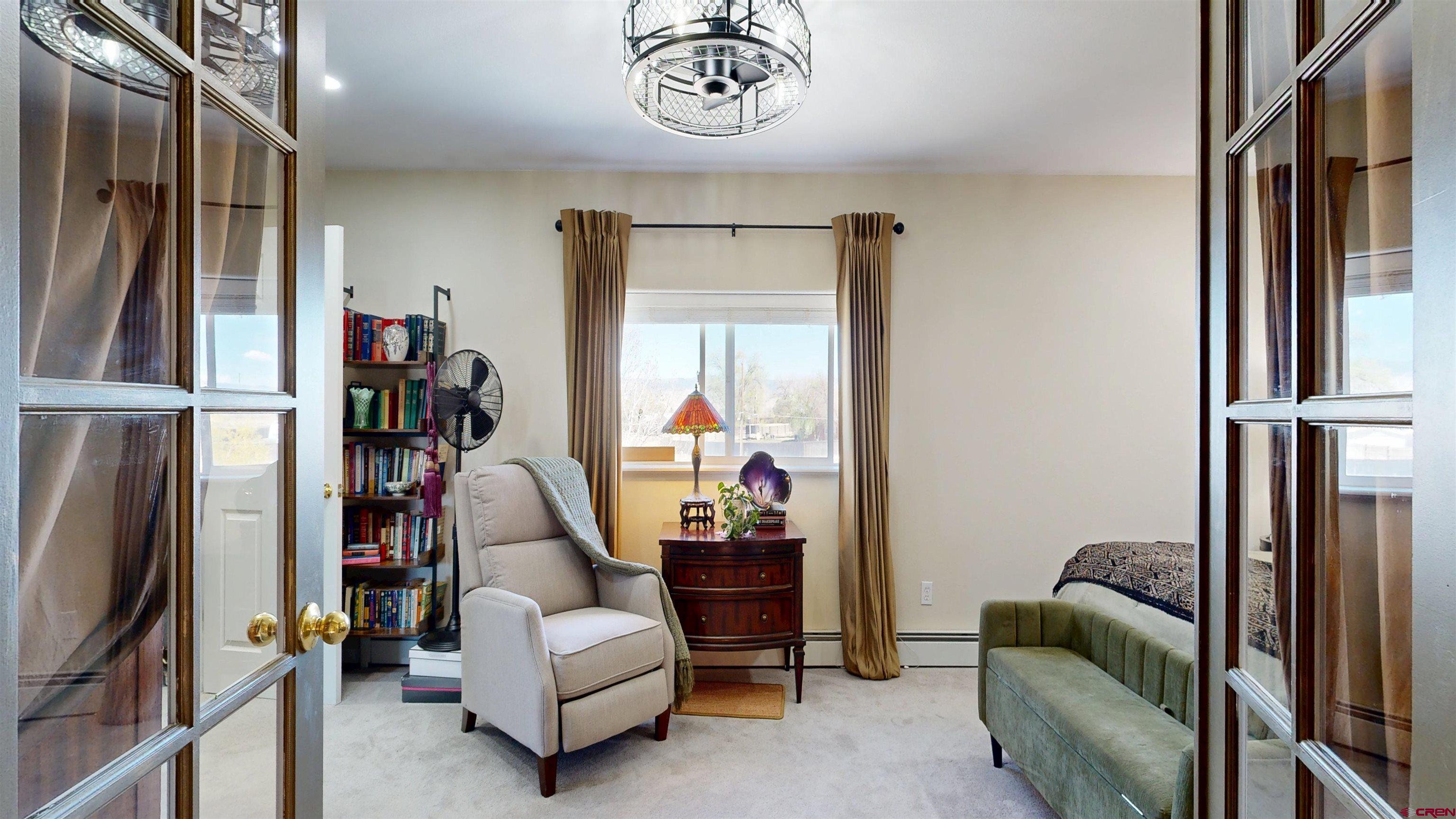 62940 Jeremy Road Montrose, CO 81401 - Photo 12 of 44 a living room with furniture