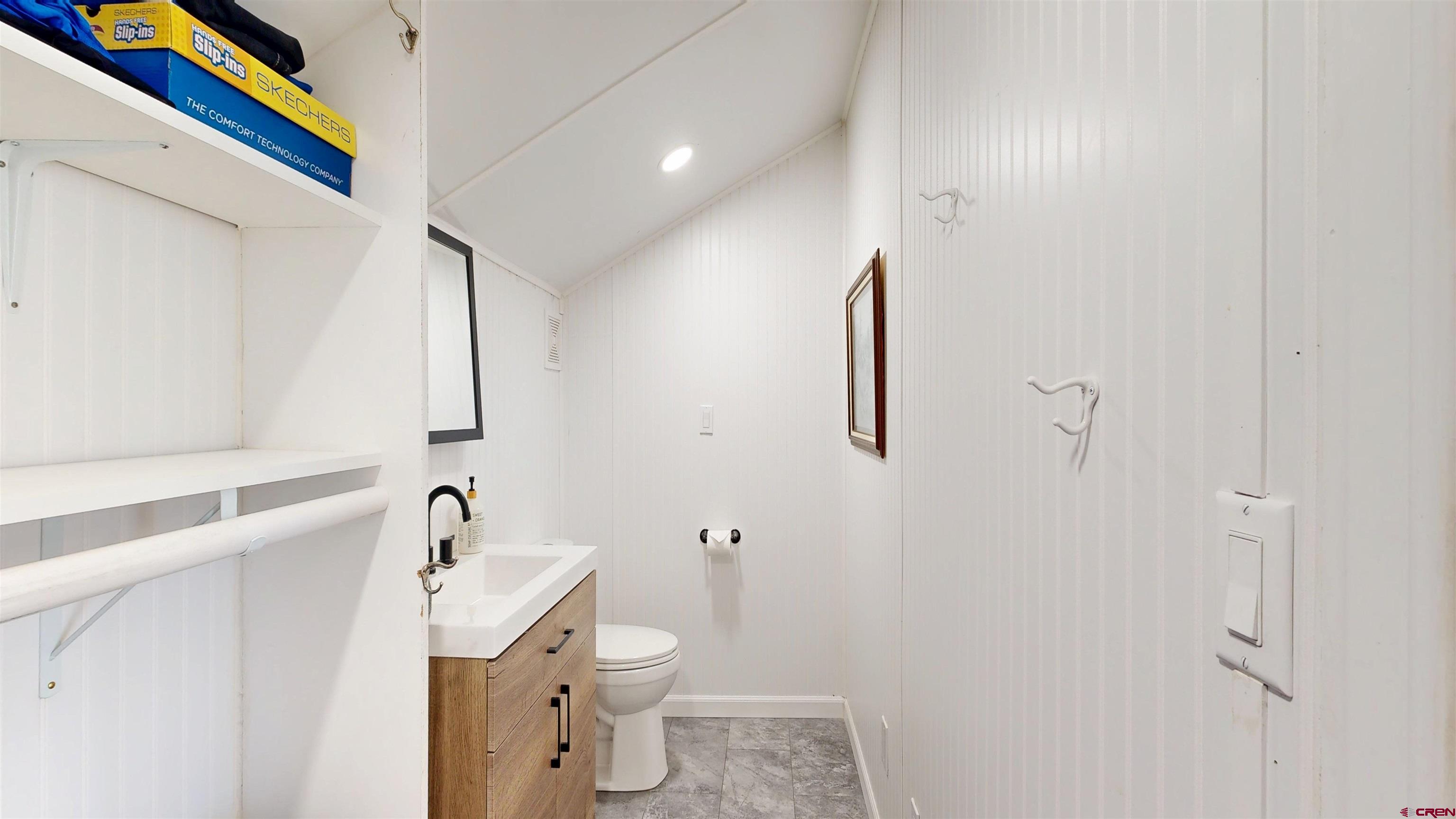 62940 Jeremy Road Montrose, CO 81401 - Photo 21 of 44 a bathroom with a sink and a toilet