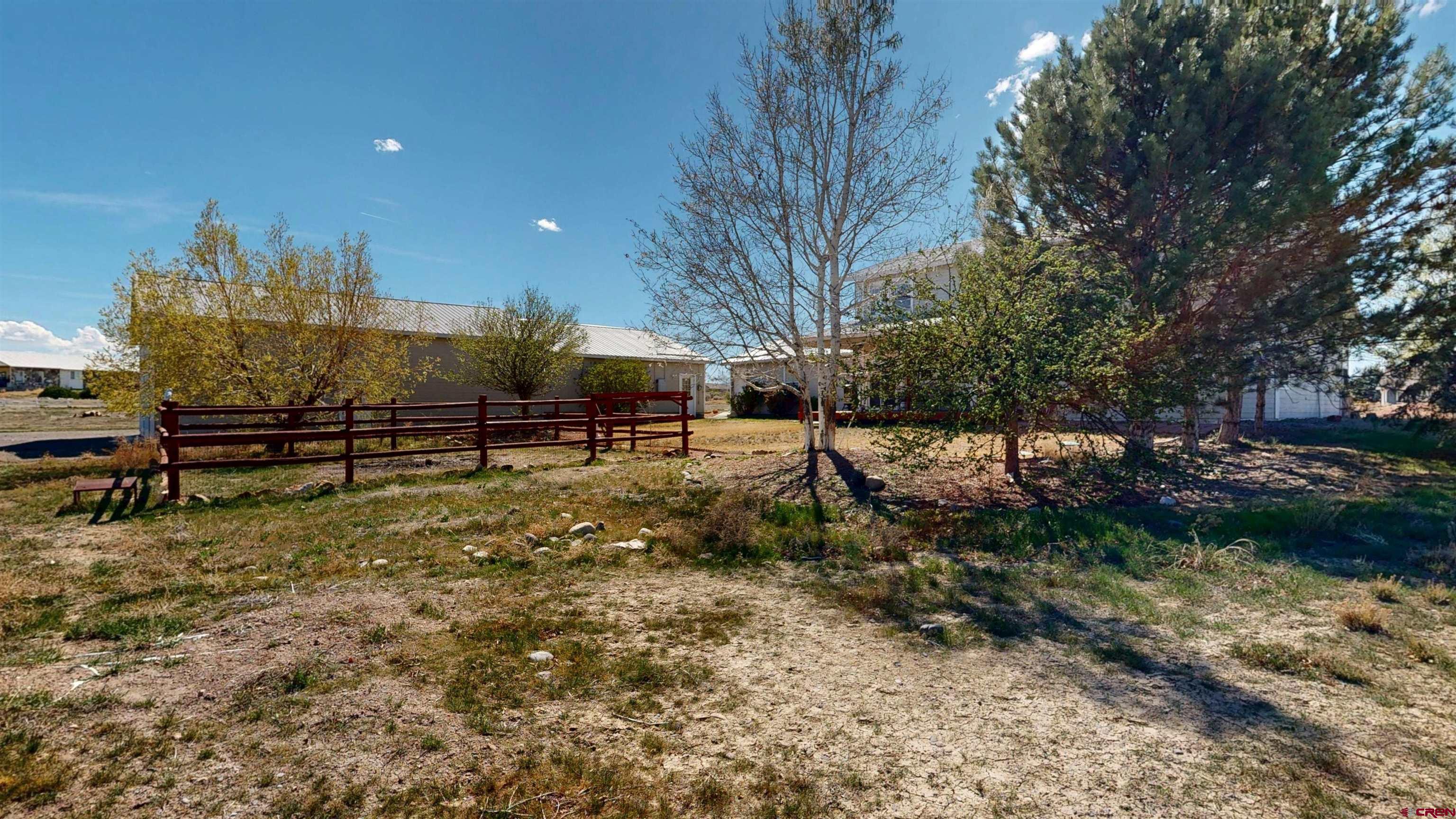62940 Jeremy Road Montrose, CO 81401 - Photo 43 of 44 a view of outdoor space with trees