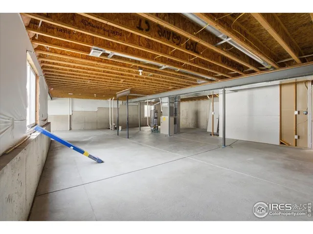 a view of an empty room with stairs