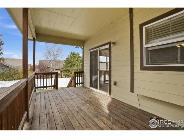 a view of balcony with wooden floor