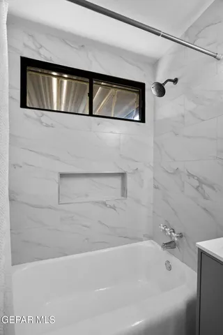 a bathroom with a bathtub