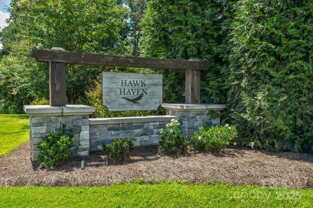 a view of a street with a small cabin