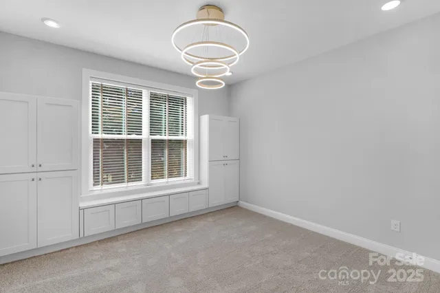 a bathroom with a tub shower and sink