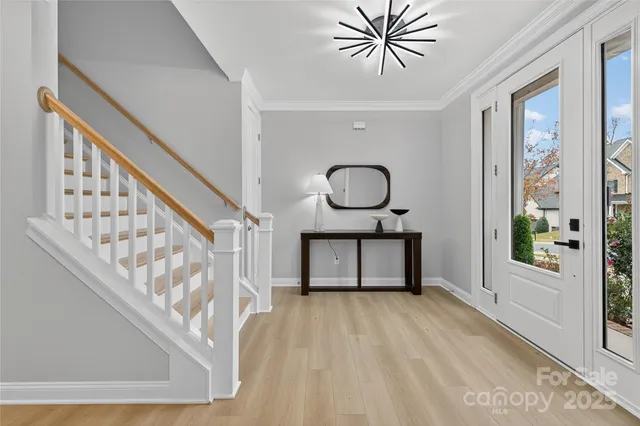 a living room with furniture fireplace and a flat screen tv