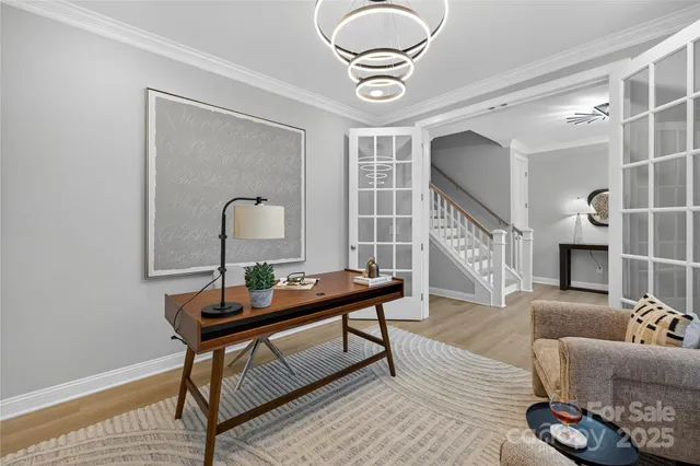 a living room with furniture fireplace and window