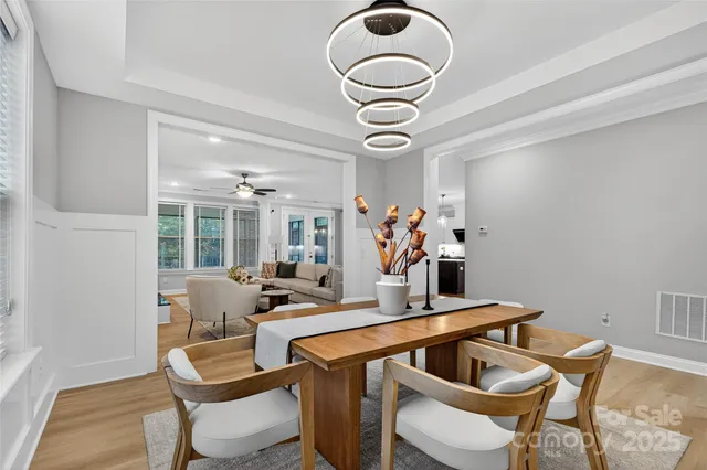 a kitchen with a table and chairs in it