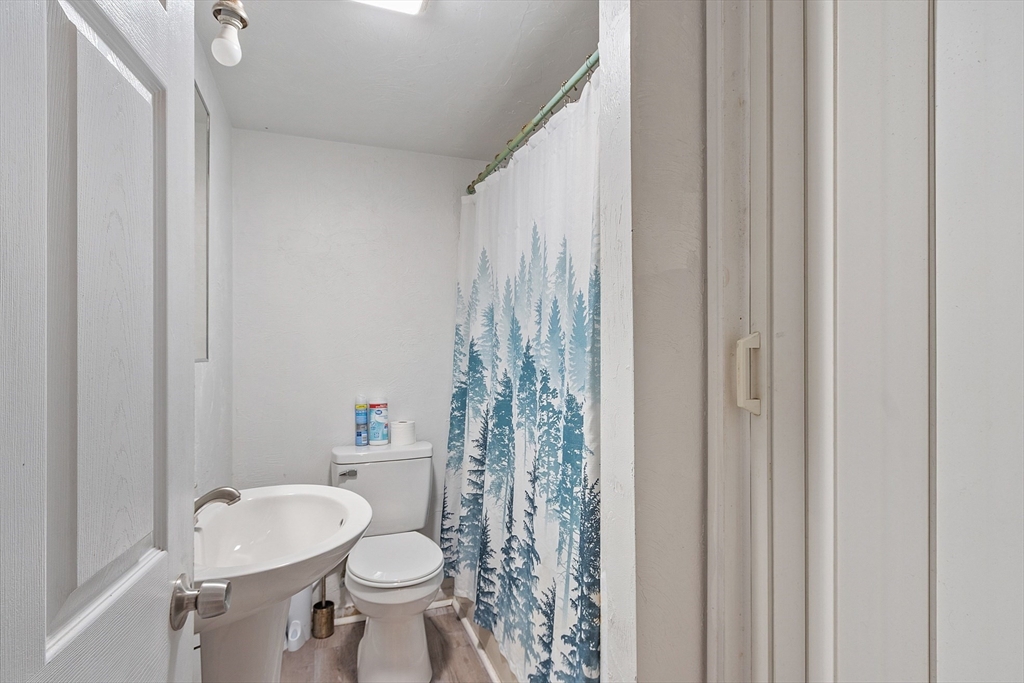 40 Aetna Street Worcester, MA 01604 - Photo 11 of 42 a bathroom with a sink toilet and shower