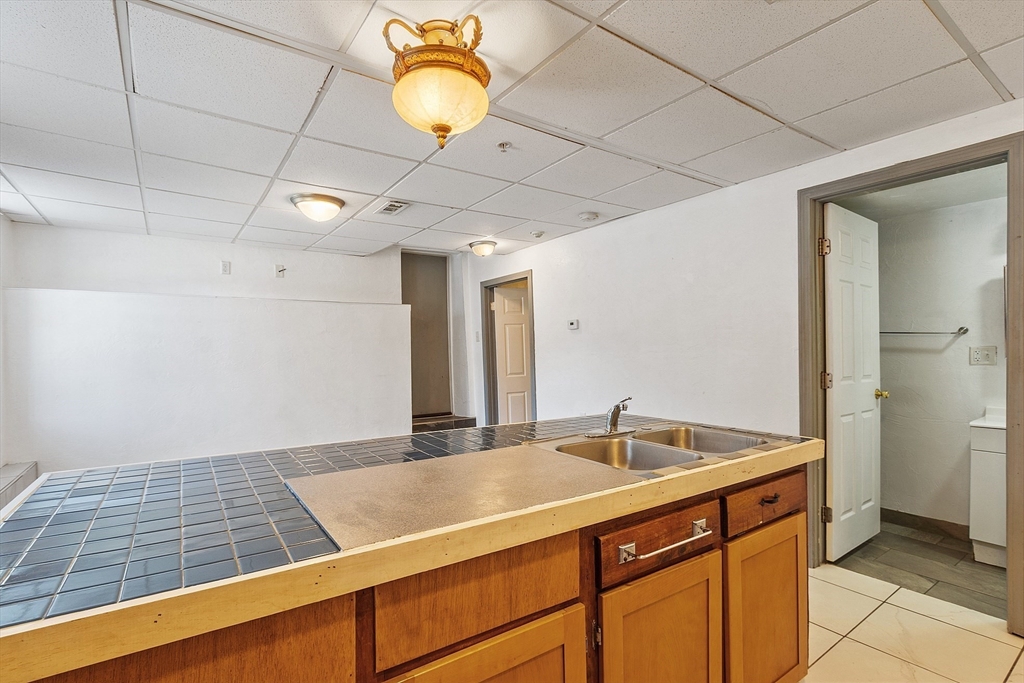 40 Aetna Street Worcester, MA 01604 - Photo 16 of 42 a room with pool table and chair