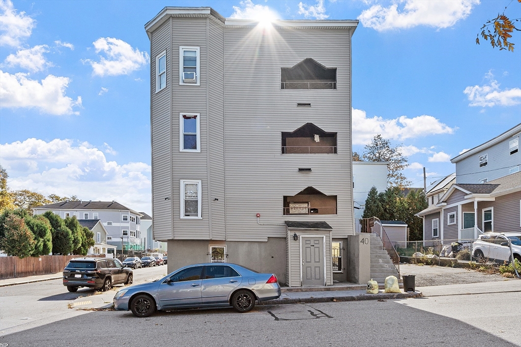 40 Aetna Street Worcester, MA 01604 - Photo 2 of 42 a car parked in front of a building