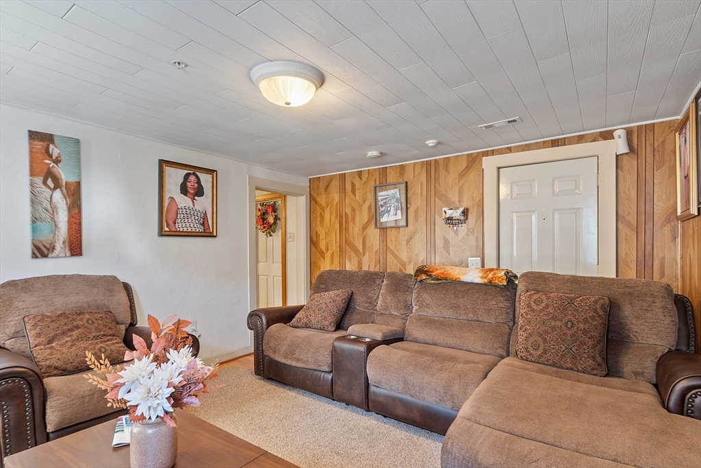 40 Aetna Street Worcester, MA 01604 - Photo 25 of 42 a living room with furniture and a large window