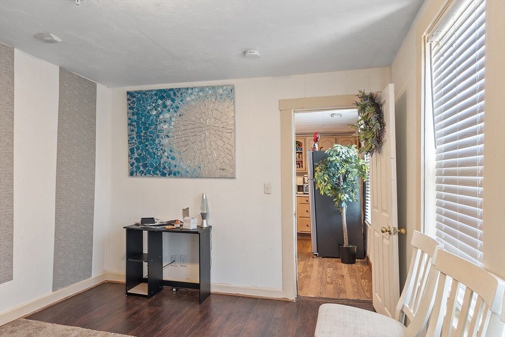 40 Aetna Street Worcester, MA 01604 - Photo 30 of 42 a view of a room with wooden floor and furniture