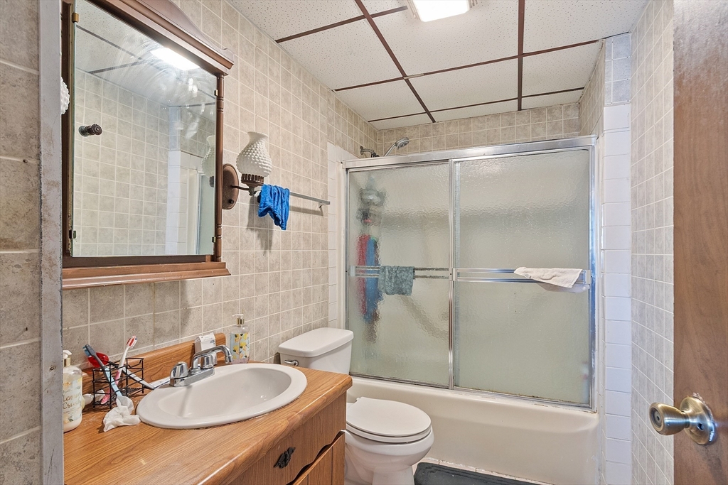 40 Aetna Street Worcester, MA 01604 - Photo 41 of 42 a bathroom with a sink toilet and shower