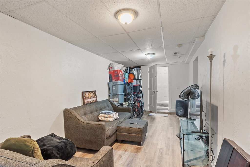 40 Aetna Street Worcester, MA 01604 - Photo 6 of 42 a living room with furniture and a wooden floor