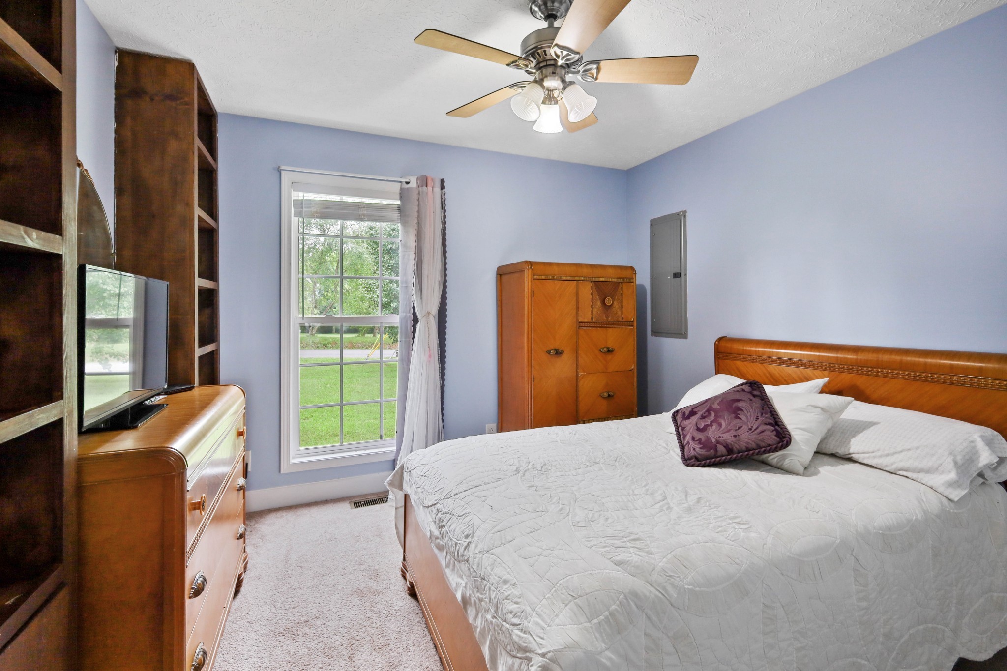395 Lear Road Portland, TN 37148 - Photo 17 of 34 a bedroom with a bed and a window