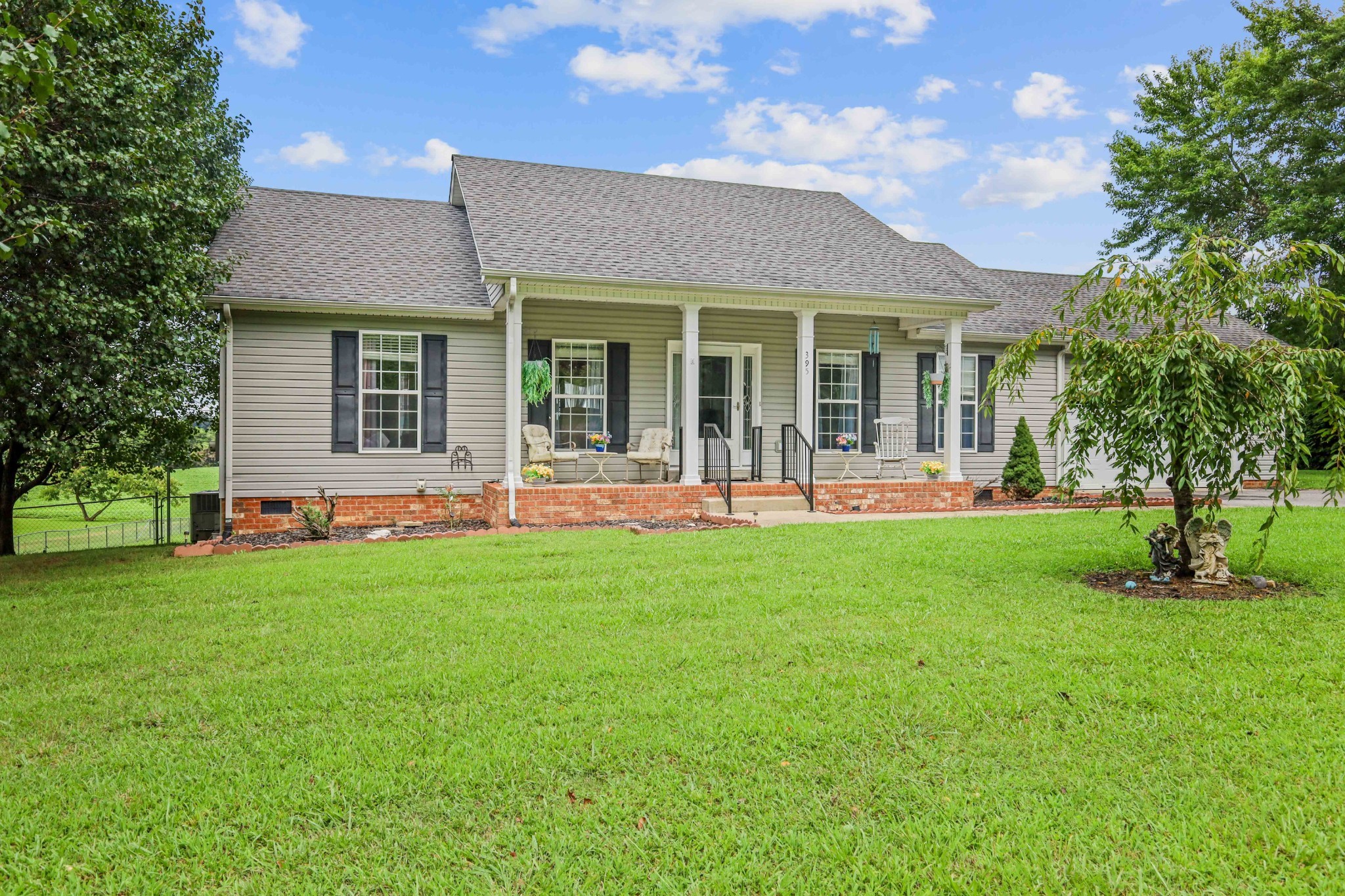 395 Lear Road Portland, TN 37148 - Photo 2 of 34 a front view of a house with a yard