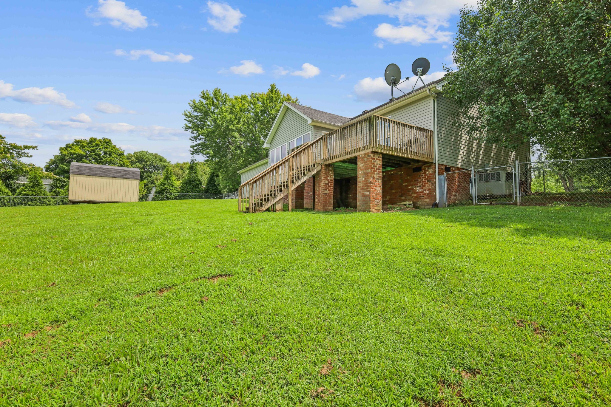 395 Lear Road Portland, TN 37148 - Photo 32 of 34 a view of a house with a yard