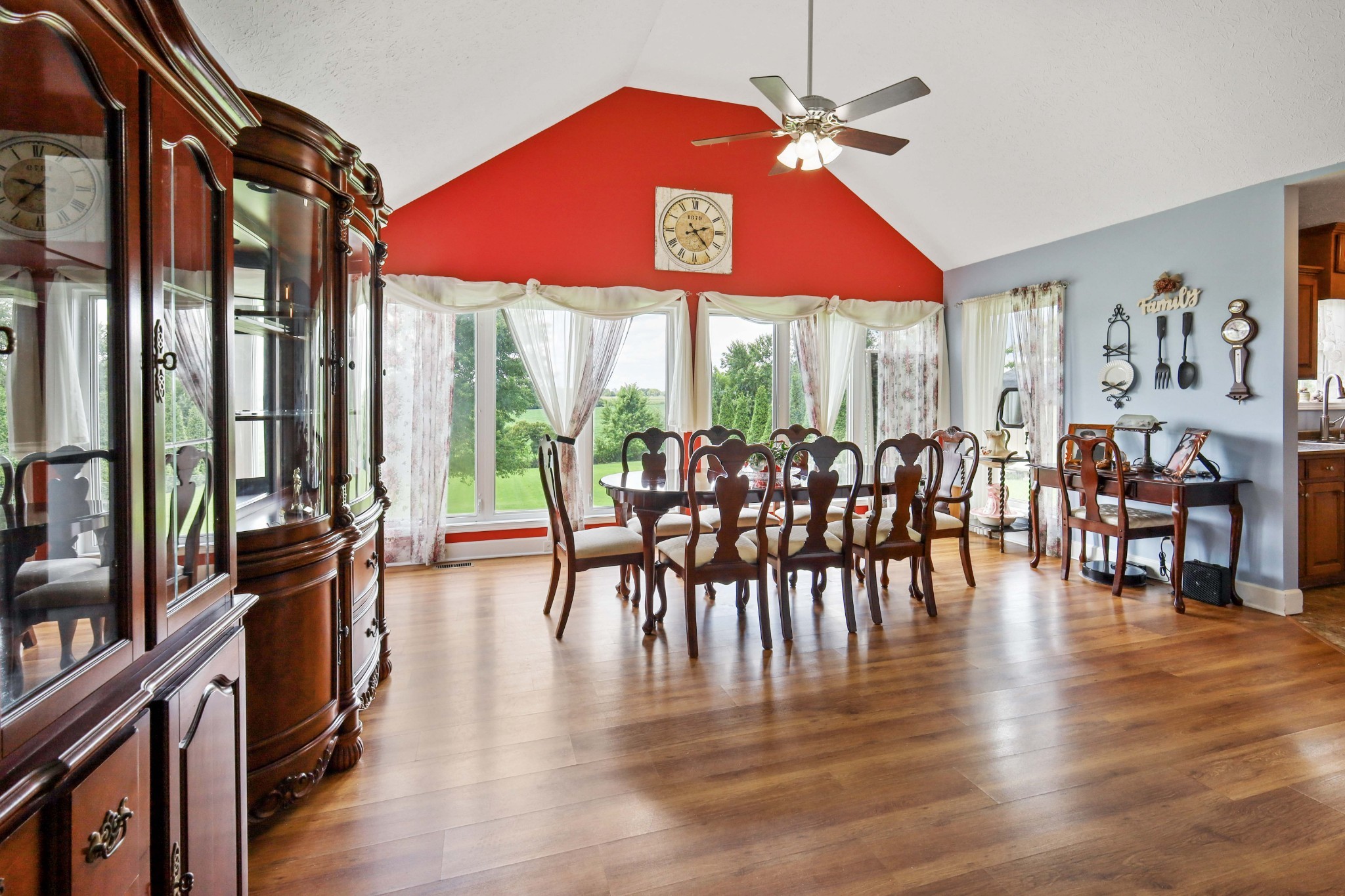 395 Lear Road Portland, TN 37148 - Photo 6 of 34 an open kitchen with granite countertop a dining table chairs with a large window