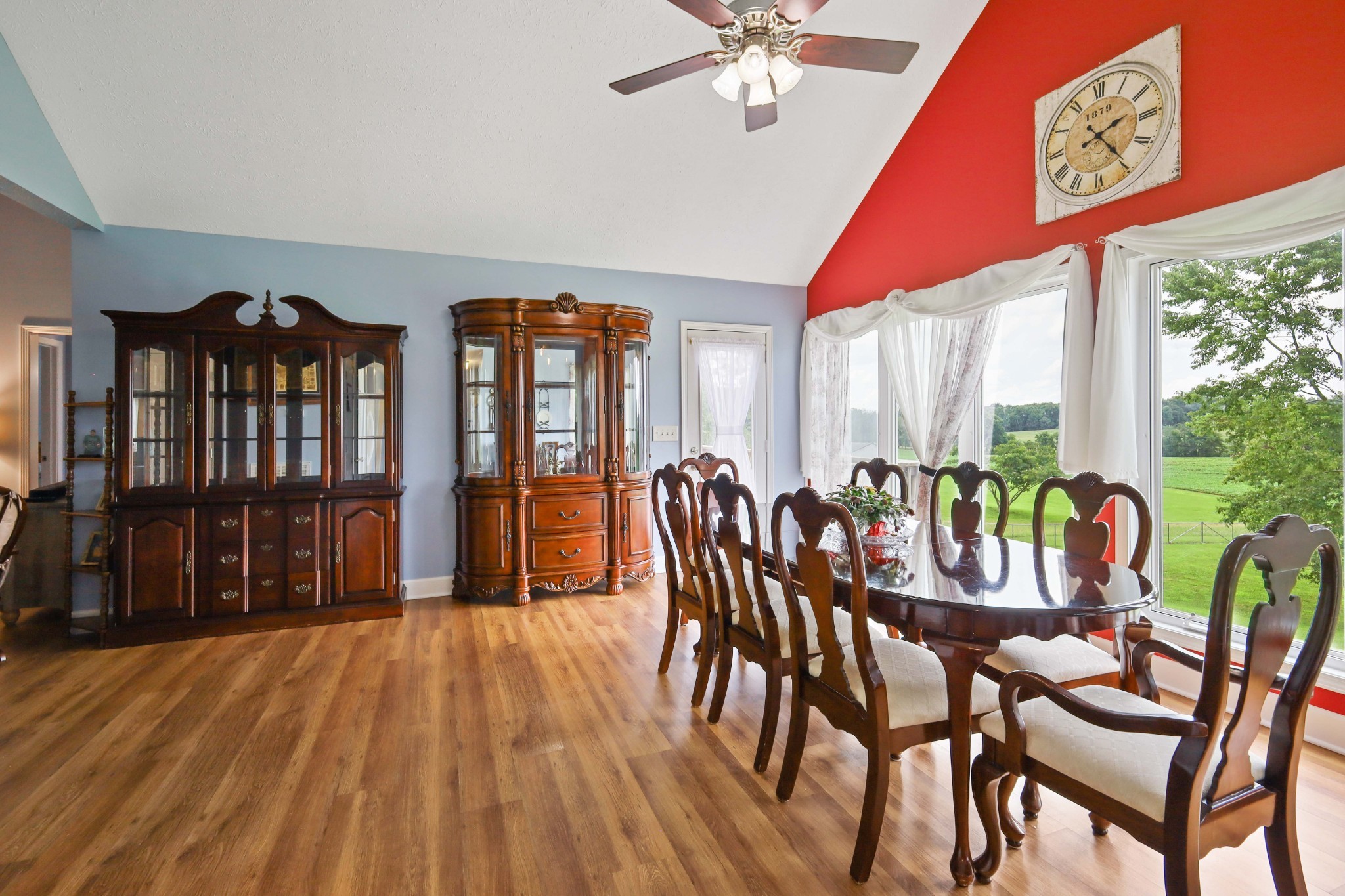 395 Lear Road Portland, TN 37148 - Photo 7 of 34 a view of a dining room with furniture window and wooden floor