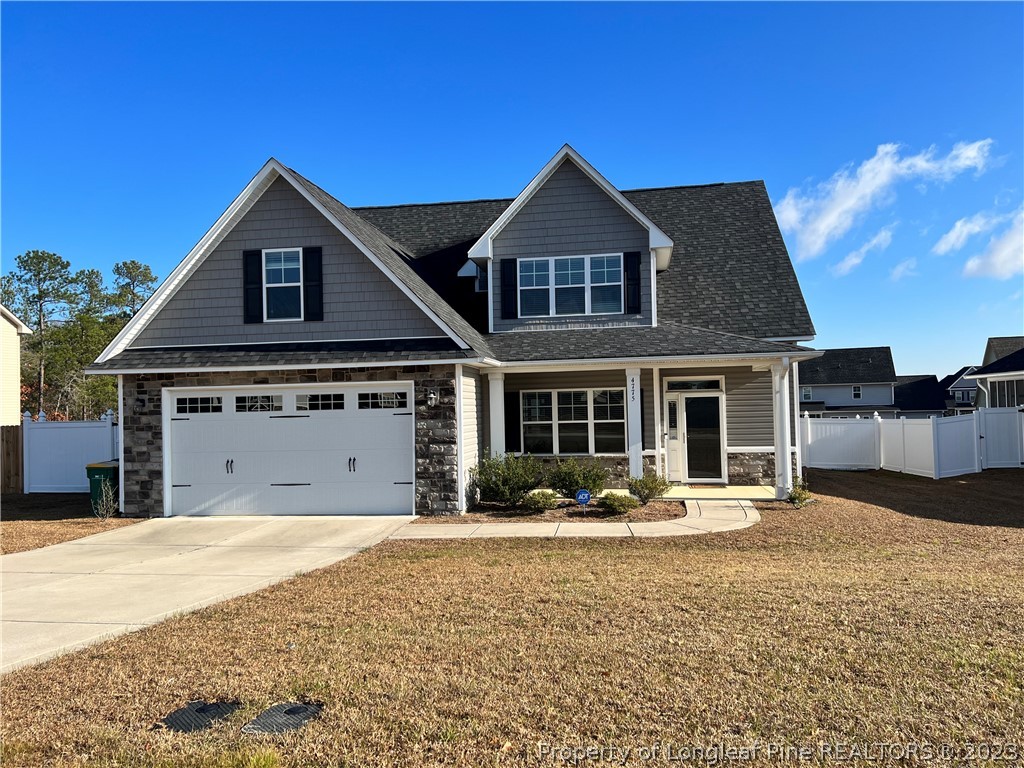 4775 McKinnon Farm Road Fayetteville, NC 28304 - Photo 1 of 45 a front view of a house with yard