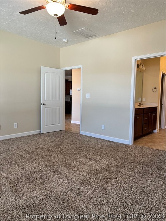 4775 McKinnon Farm Road Fayetteville, NC 28304 - Photo 19 of 45 an empty room with closet and a ceiling fan