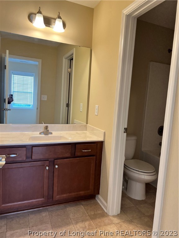 4775 McKinnon Farm Road Fayetteville, NC 28304 - Photo 32 of 45 a bathroom with a sink and a toilet
