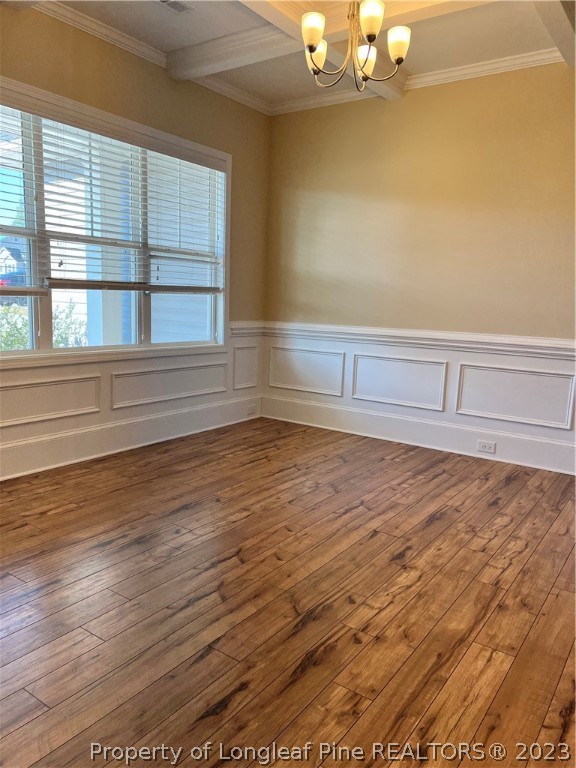 4775 McKinnon Farm Road Fayetteville, NC 28304 - Photo 6 of 45 a view of wooden floor and windows in a room