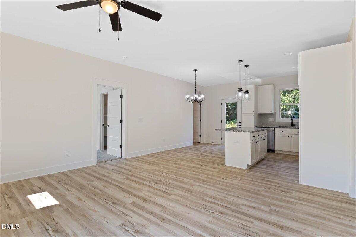 1655 Bunnlevel Erwin Road Bunnlevel, NC 28323 - Photo 5 of 26 a view of empty room with wooden floor