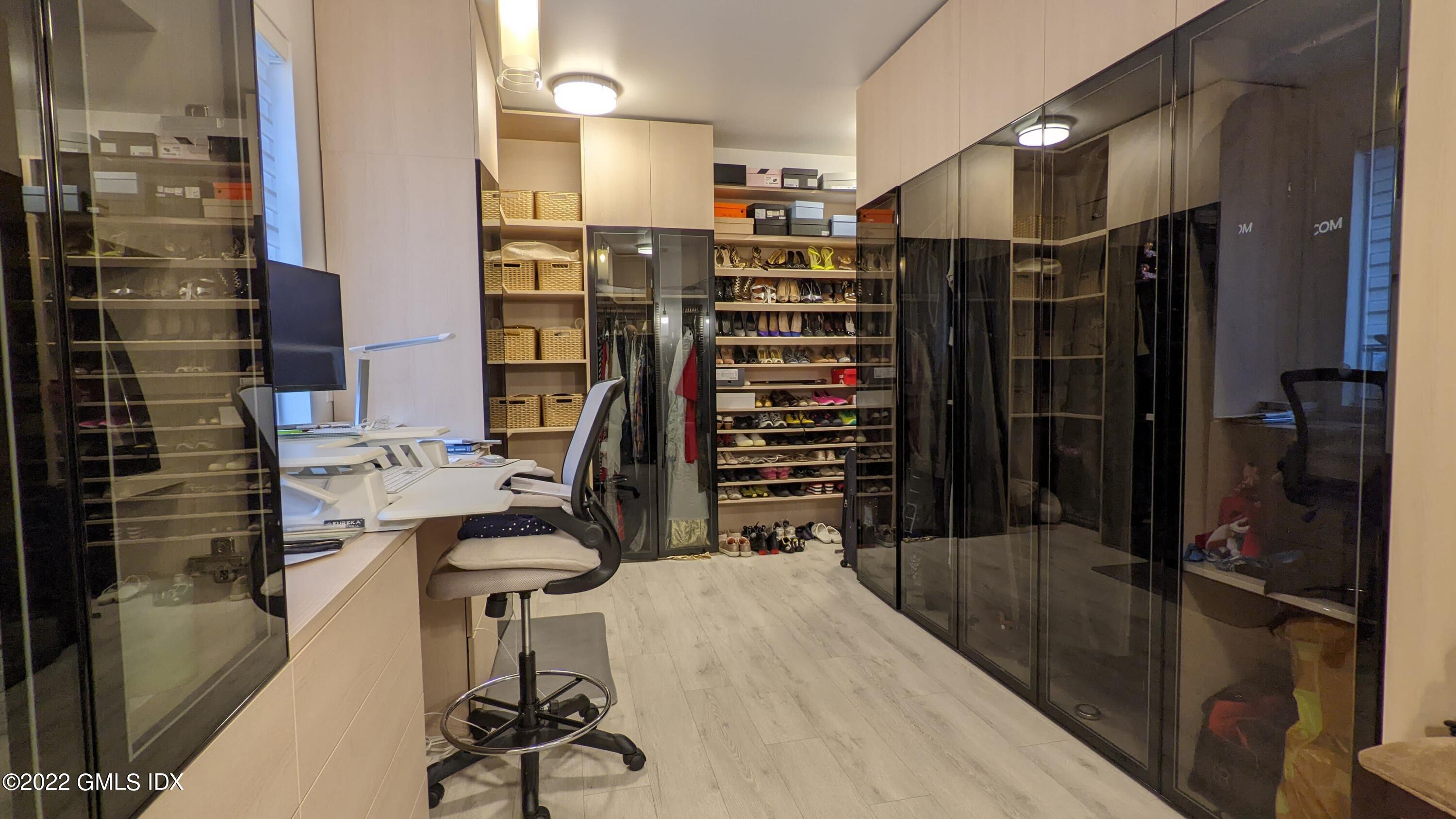 39 Nutmeg Drive Greenwich, CT 06831 - Photo 19 of 31 a bathroom with a sink and a shower