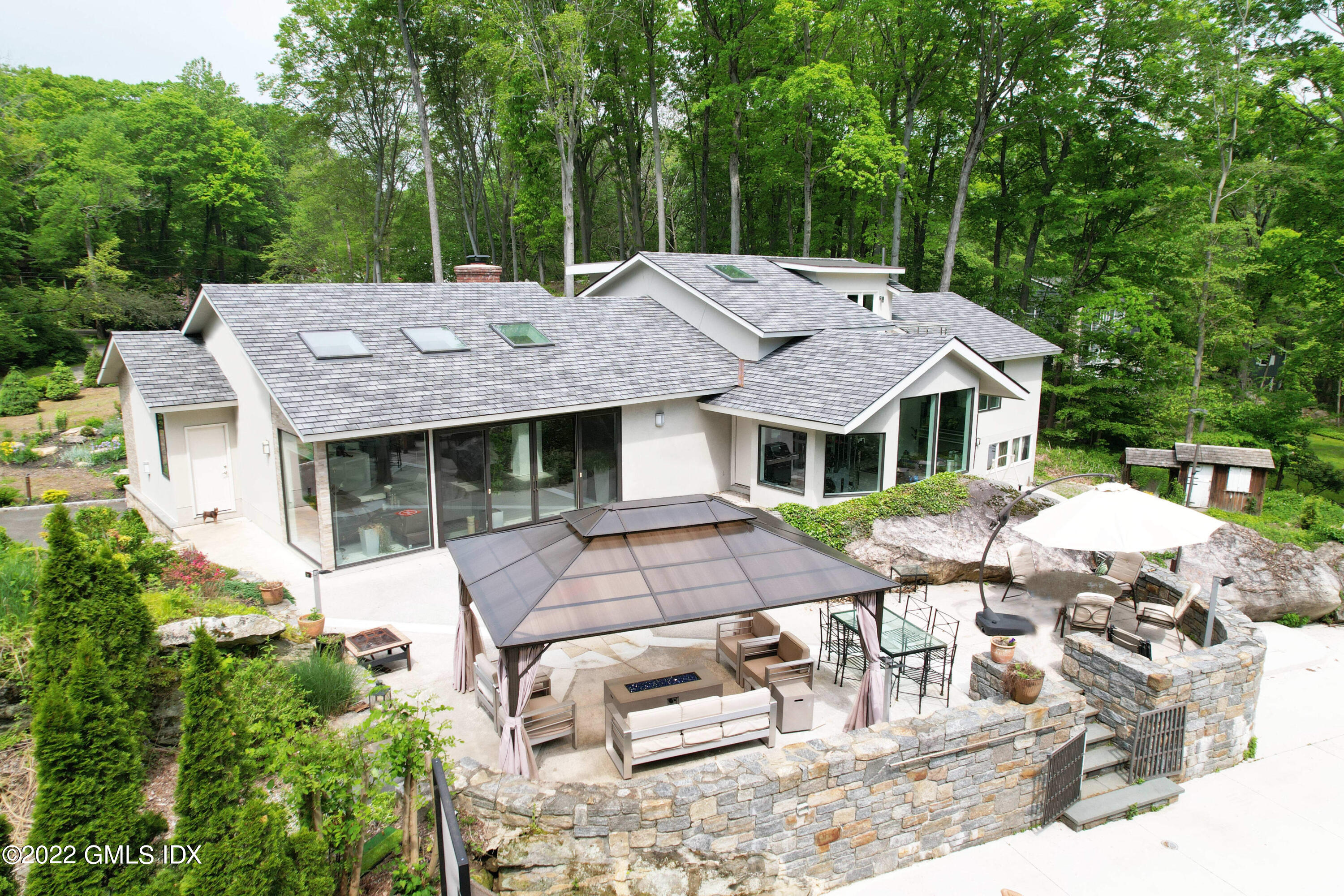 39 Nutmeg Drive Greenwich, CT 06831 - Photo 2 of 31 an aerial view of a house with swimming pool and furniture