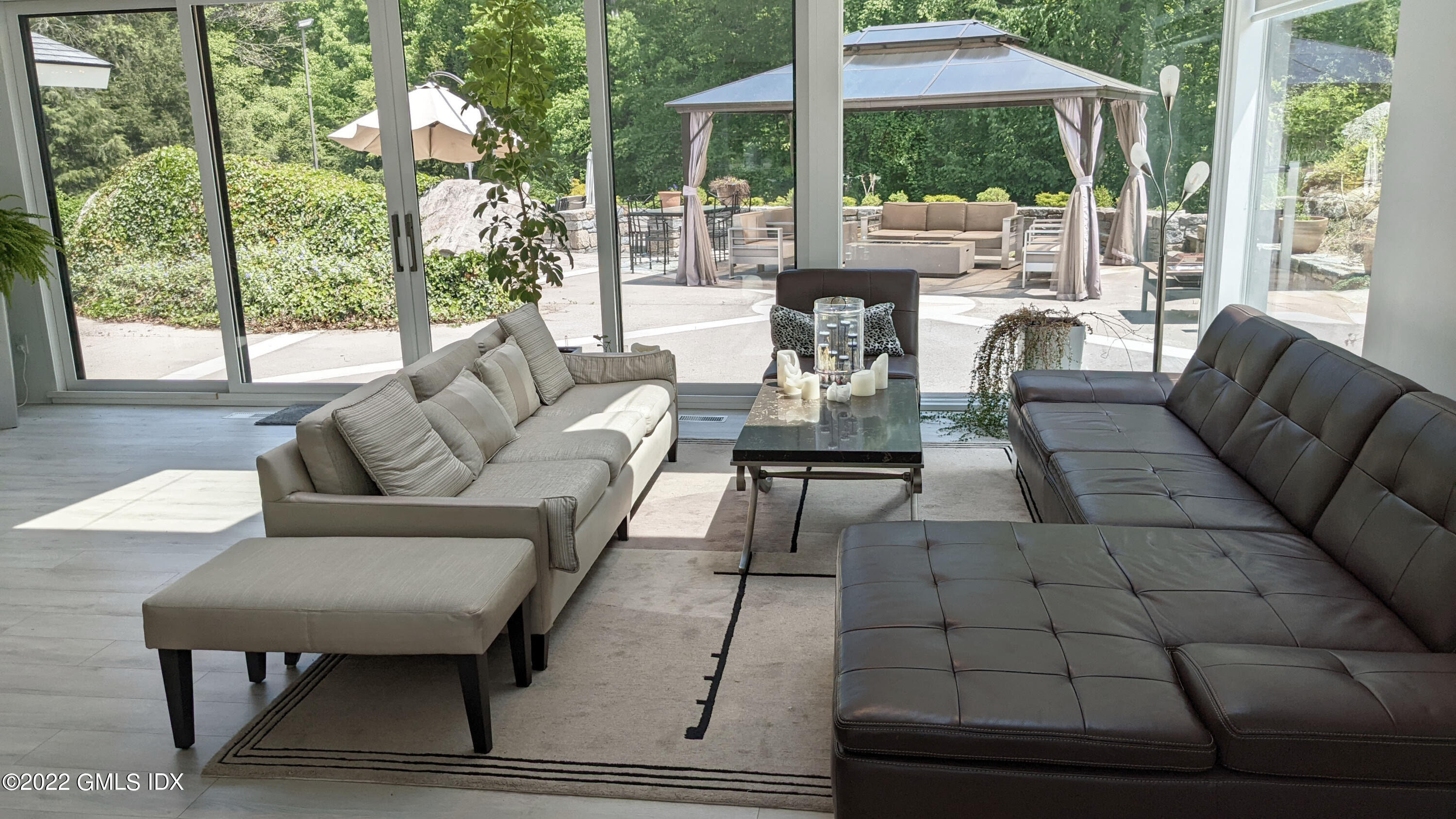 39 Nutmeg Drive Greenwich, CT 06831 - Photo 6 of 31 a living room with furniture and a large window