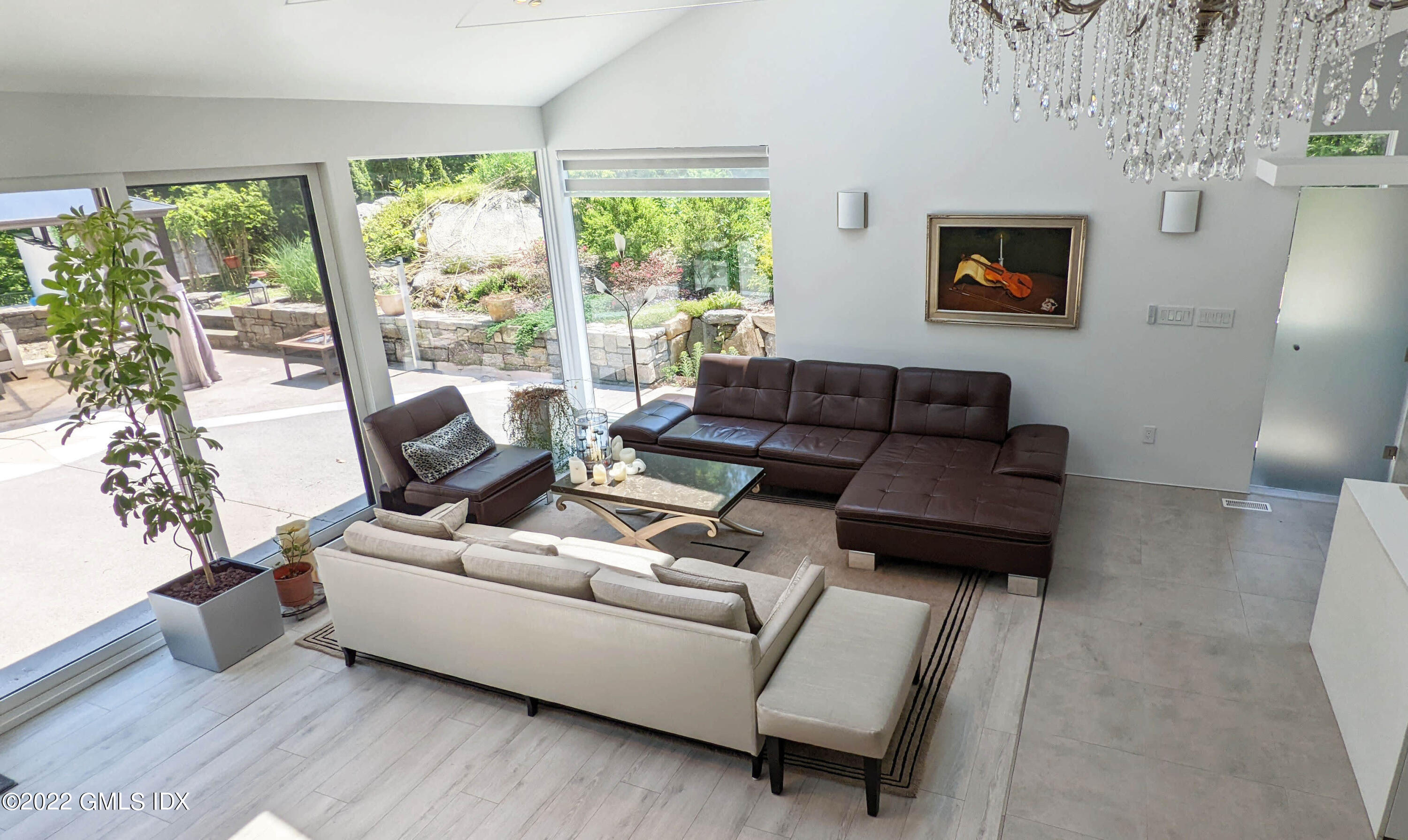 39 Nutmeg Drive Greenwich, CT 06831 - Photo 7 of 31 a living room with furniture and a large window
