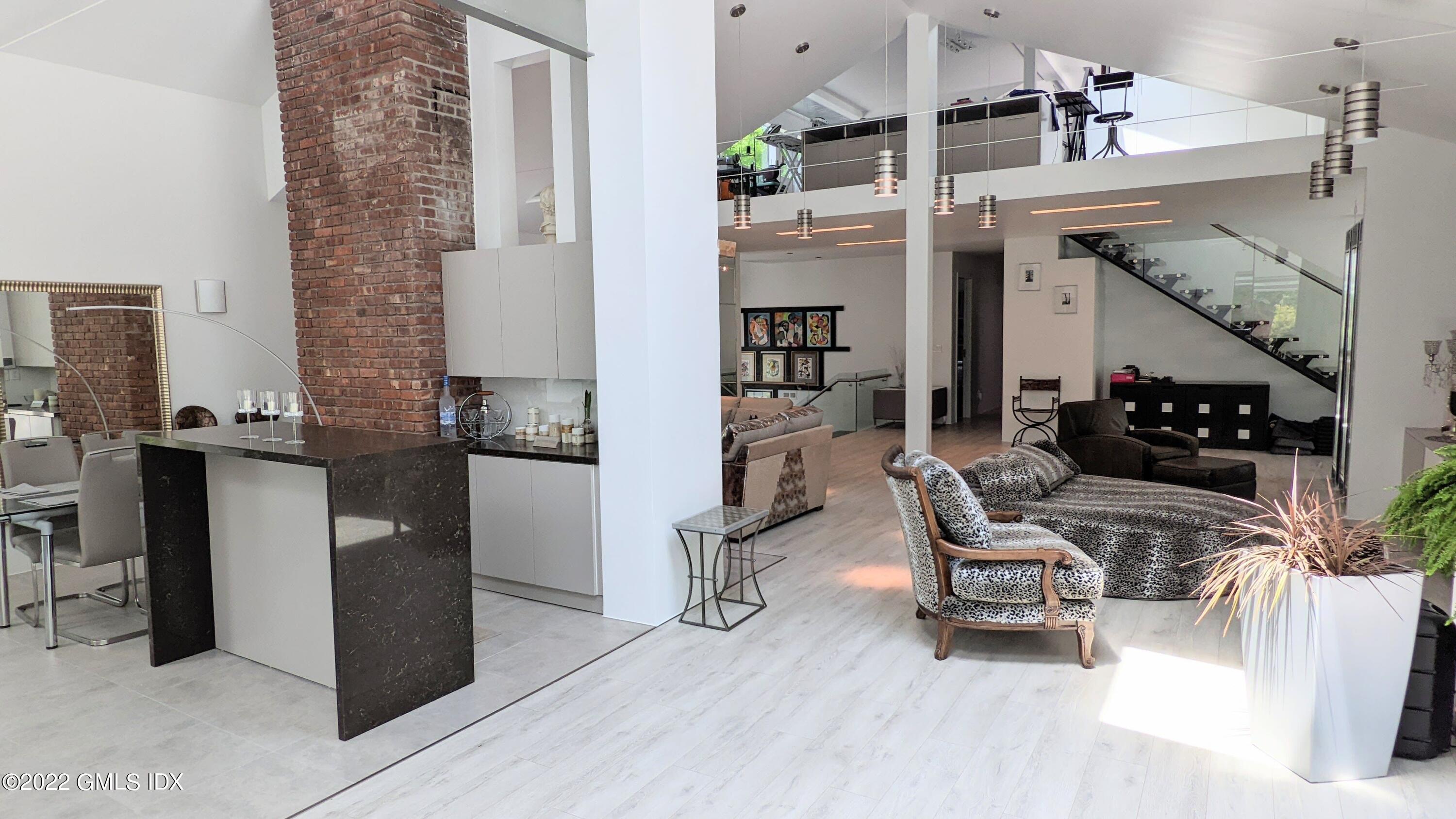 39 Nutmeg Drive Greenwich, CT 06831 - Photo 9 of 31 a living room with furniture