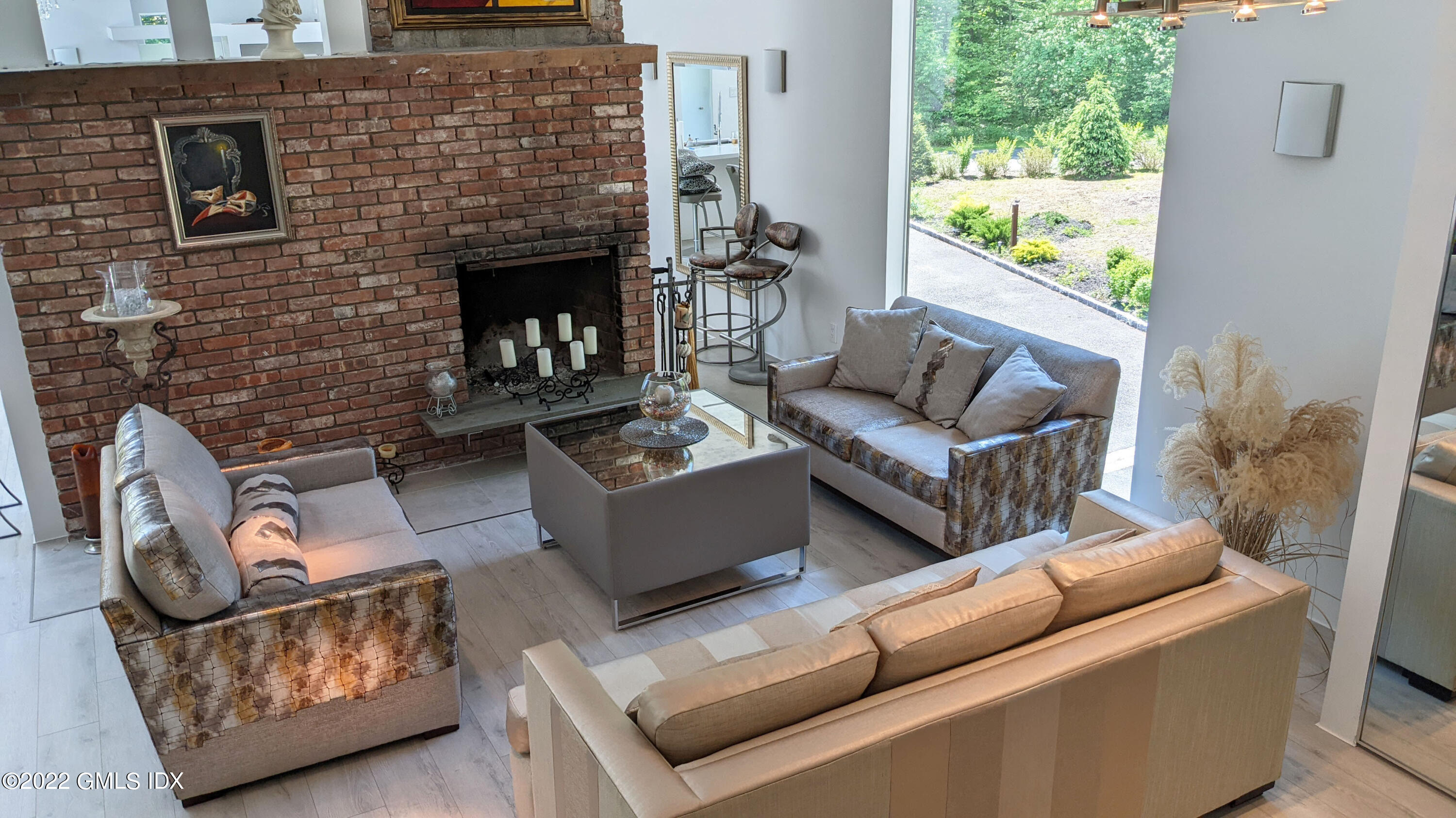 39 Nutmeg Drive Greenwich, CT 06831 - Photo 10 of 31 a living room with furniture and a fireplace