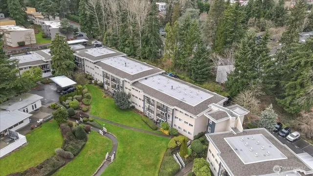an aerial view of a house with a garden