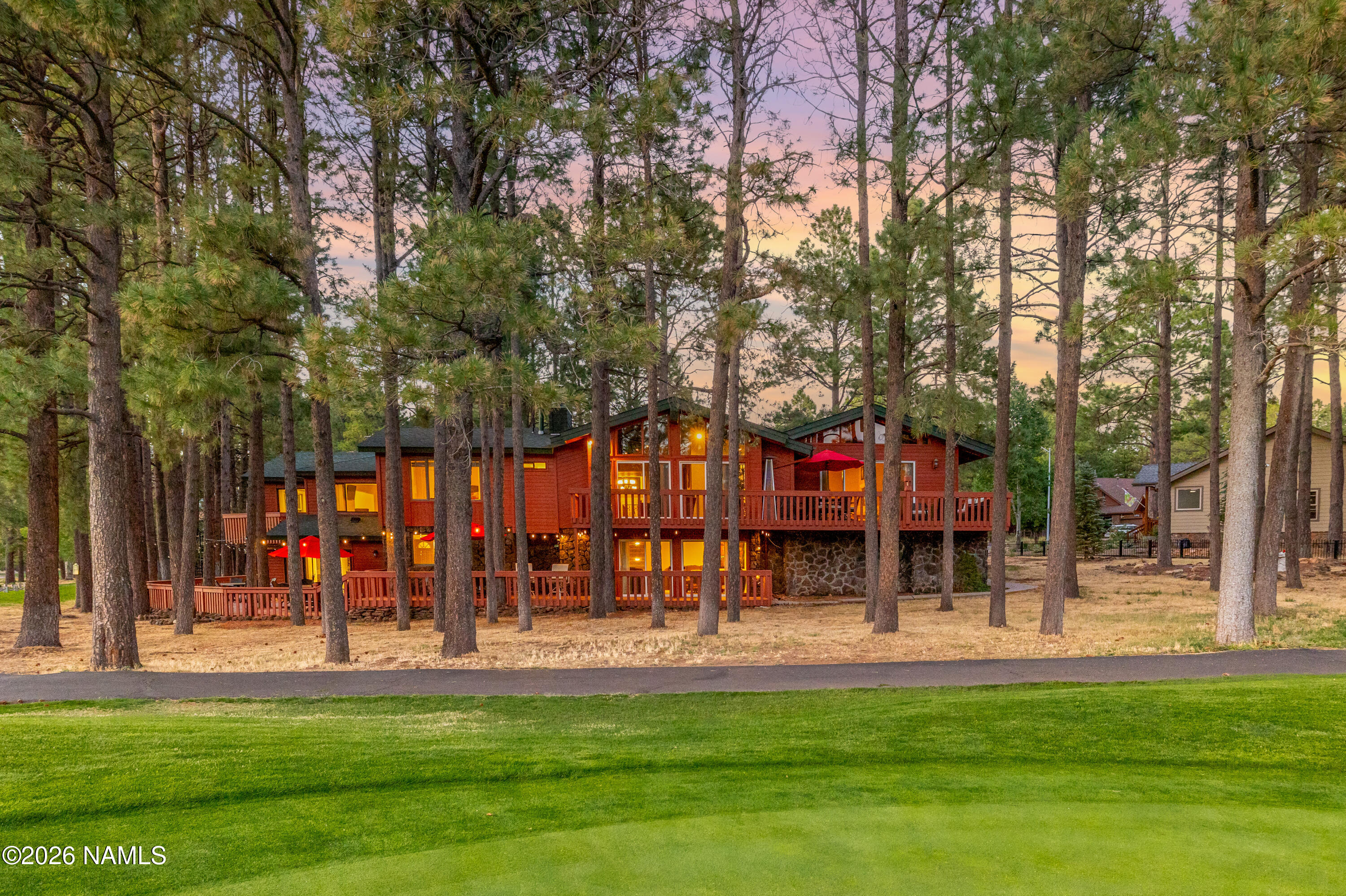 1407 North Mariposa Road Flagstaff, AZ 86004 - Photo 1 of 85 a view of a park with large trees