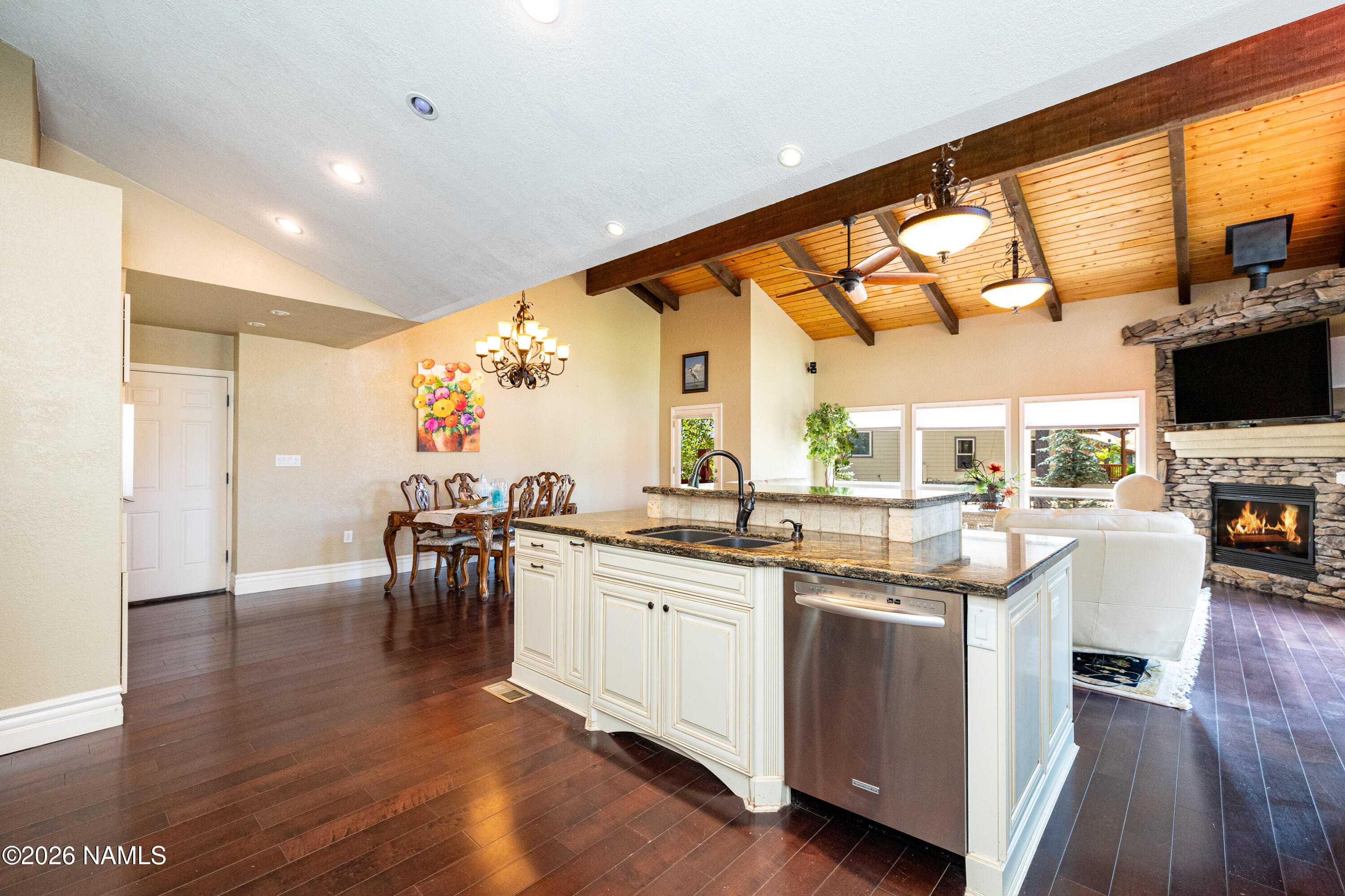1407 North Mariposa Road Flagstaff, AZ 86004 - Photo 20 of 85 a kitchen with lots of counter top space and dining table