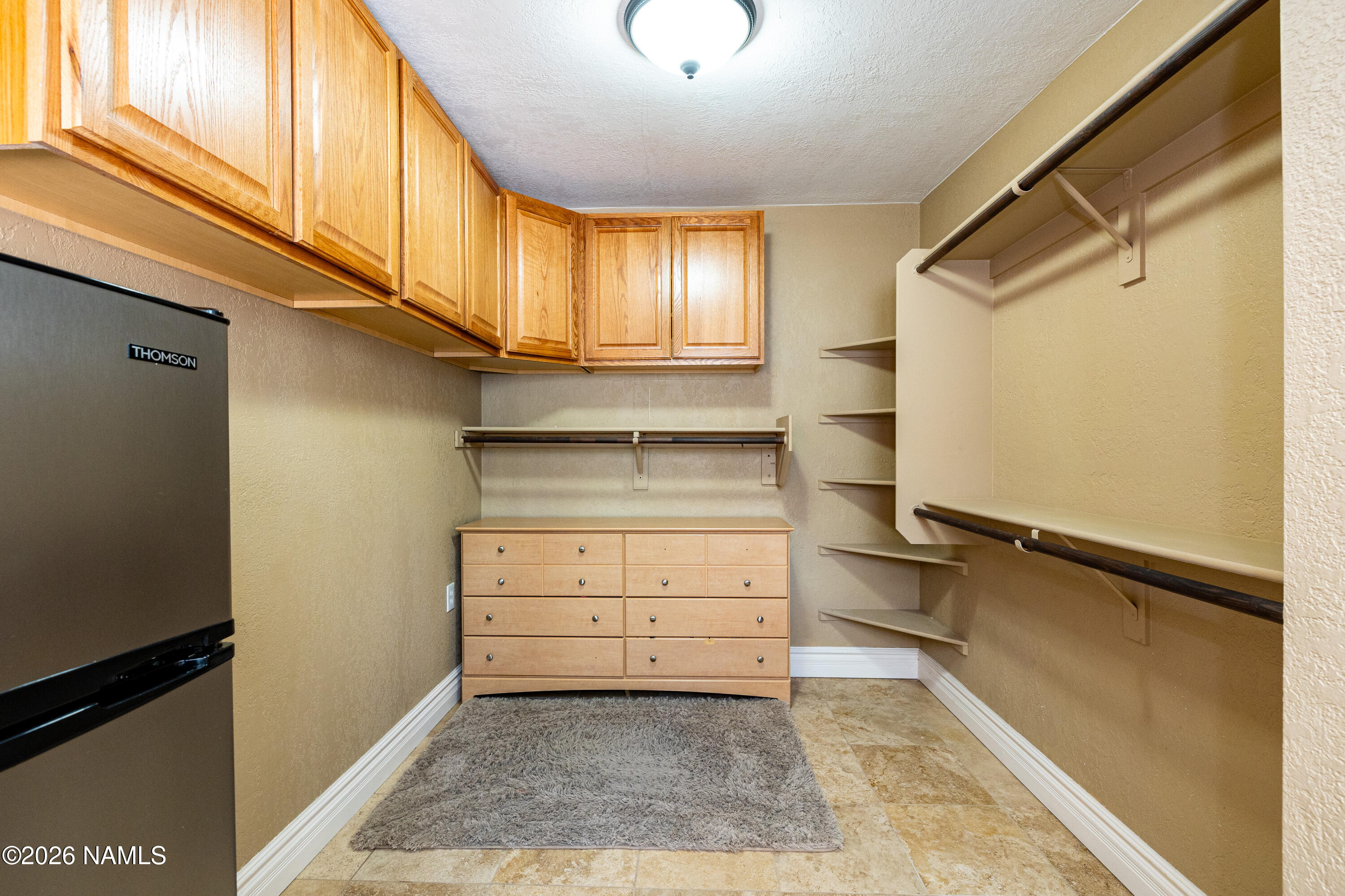 1407 North Mariposa Road Flagstaff, AZ 86004 - Photo 29 of 85 a view of walk in closet and window