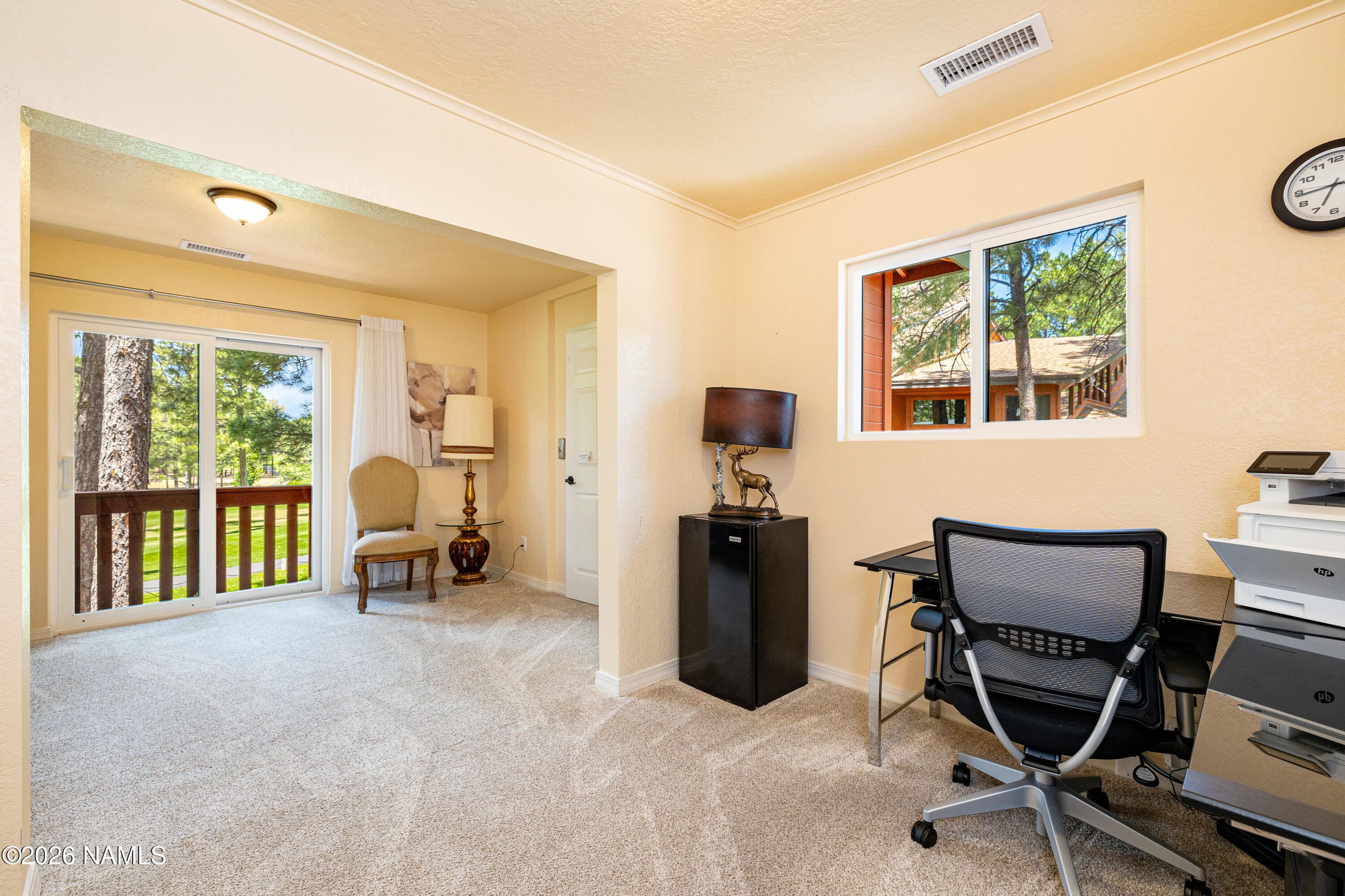 1407 North Mariposa Road Flagstaff, AZ 86004 - Photo 35 of 85 a view of workspace with wooden floor windows