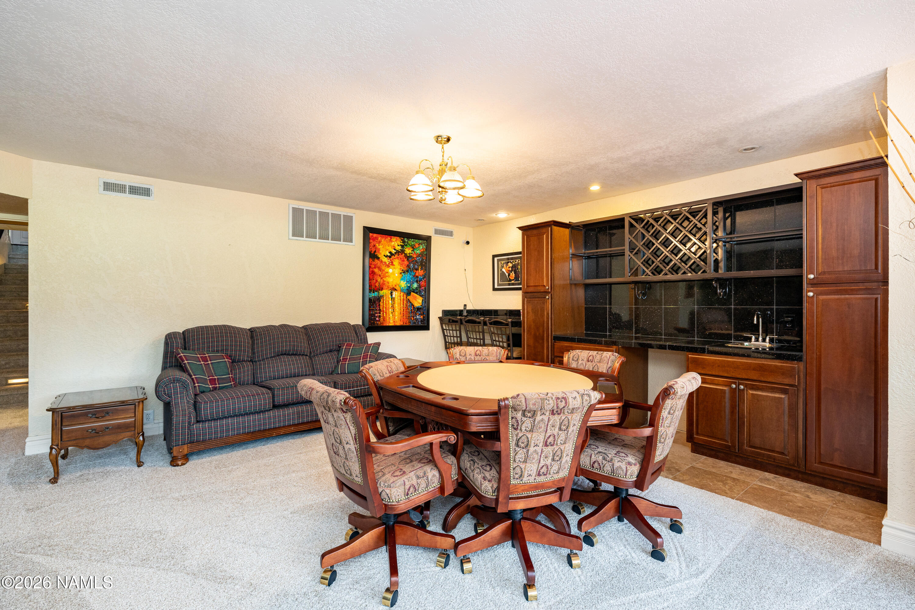 1407 North Mariposa Road Flagstaff, AZ 86004 - Photo 46 of 85 a view of a dining room with furniture