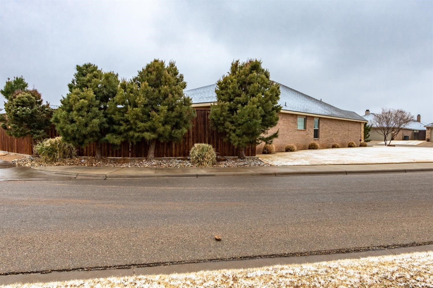 9301 Rochester Avenue Lubbock, TX 79424 - Photo 40 of 49 a view of a house with a yard